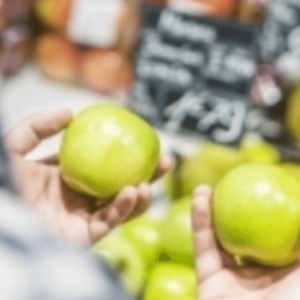 holding 2 green apple